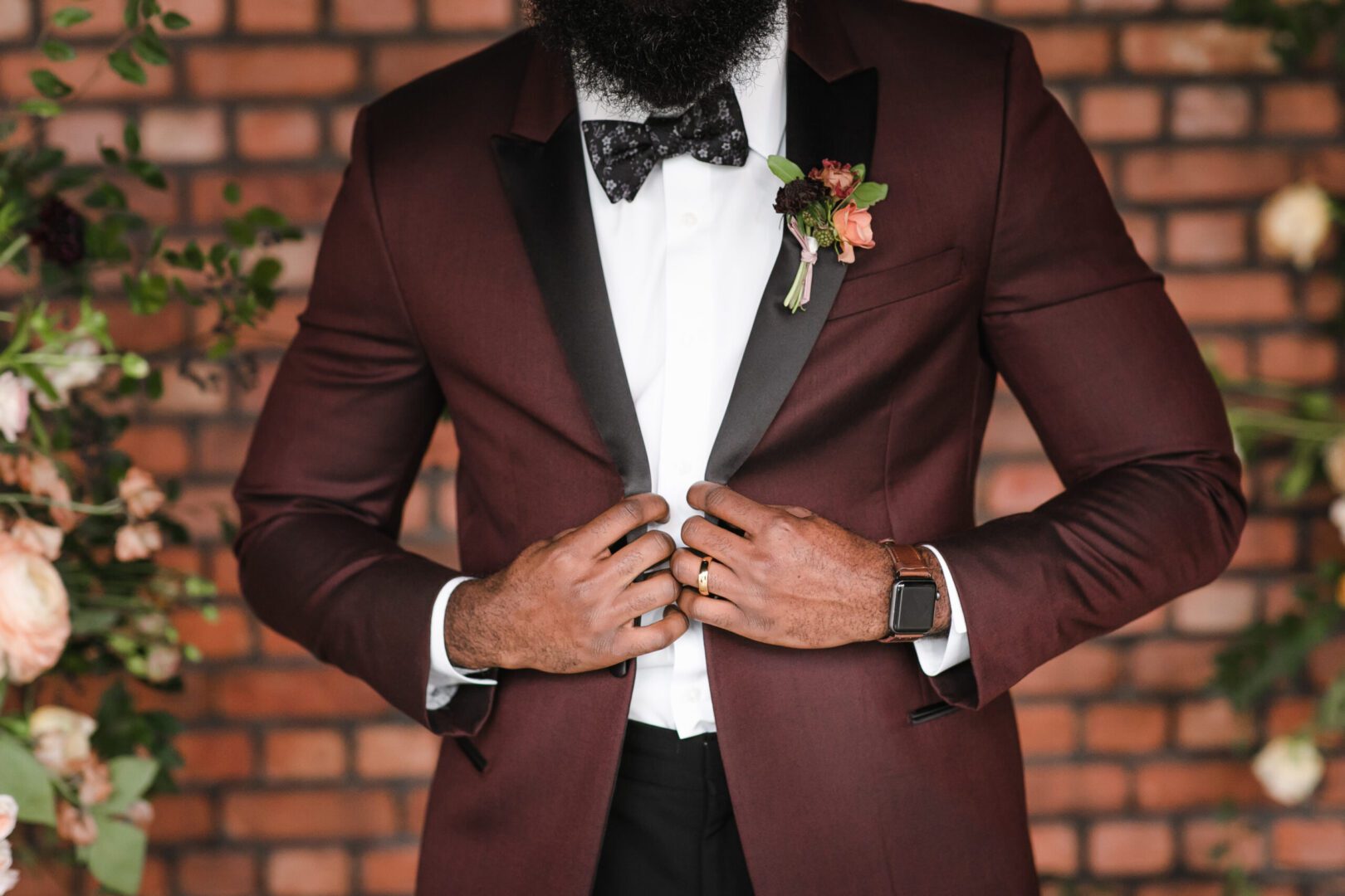 A man in a suit and bow tie