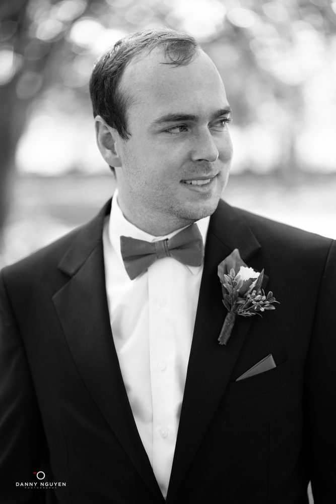 A man in a suit and bow tie.