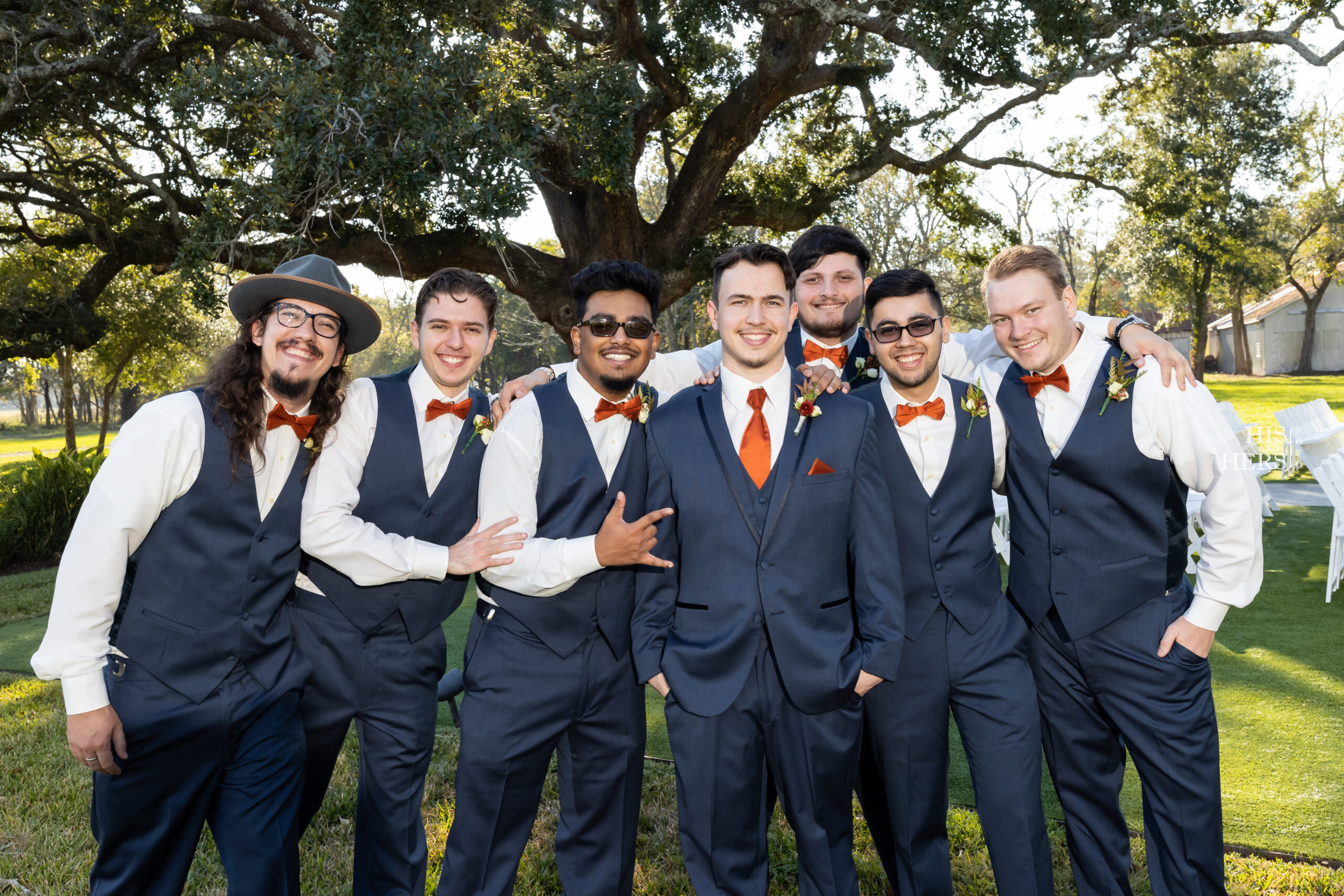 A group of men in suits and ties posing for the camera.