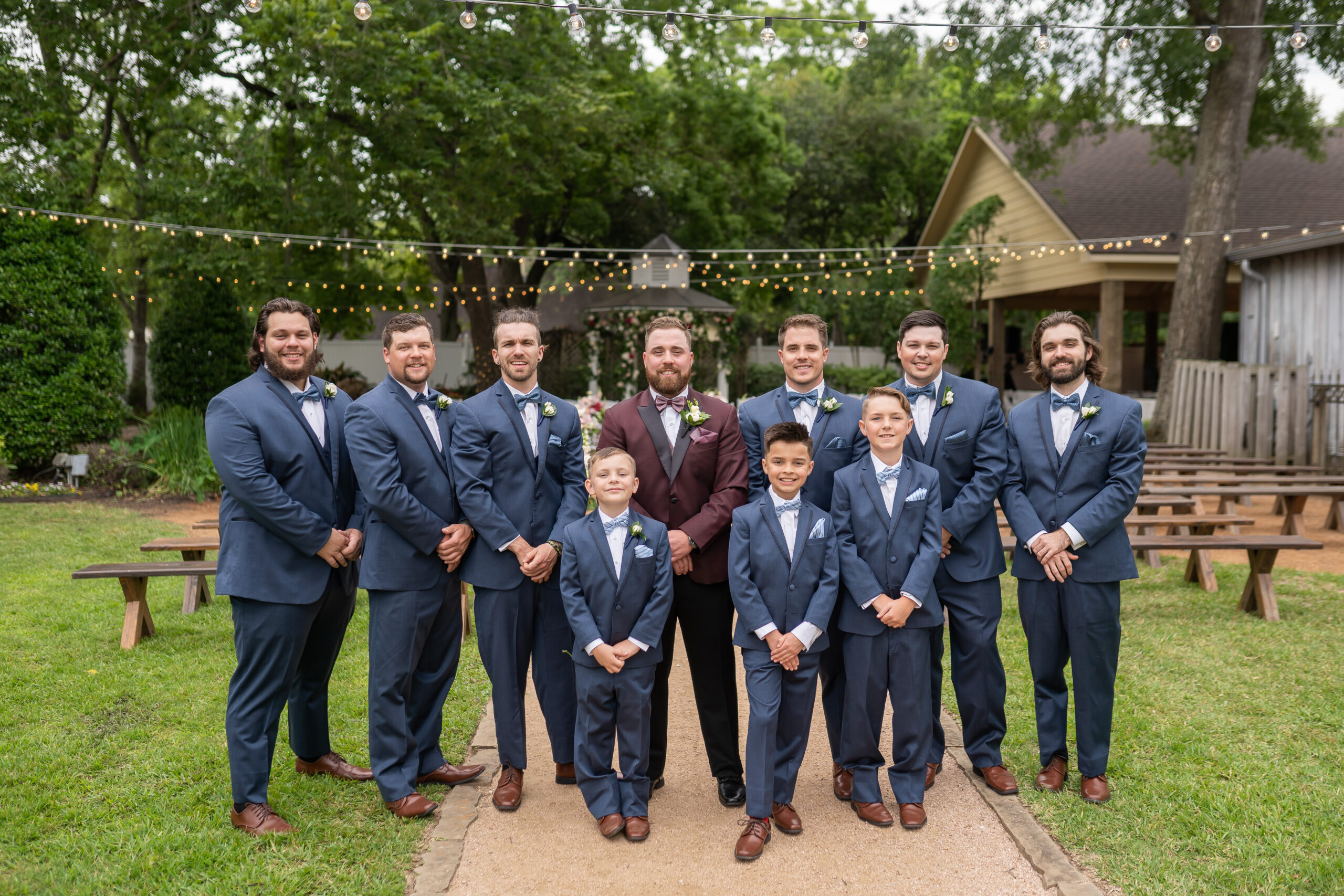 A group of men in suits posing for a picture.