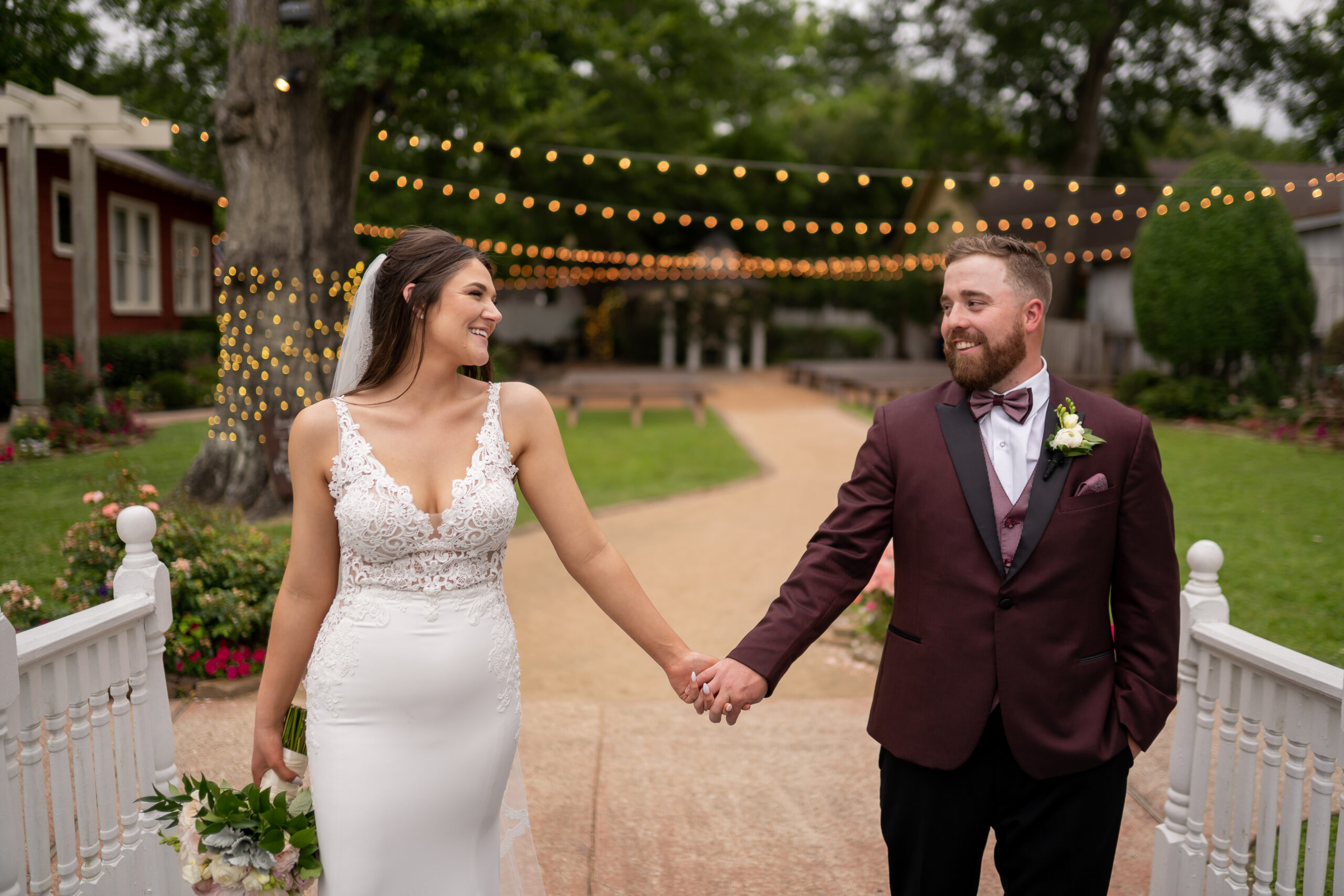 A man and woman holding hands while walking.